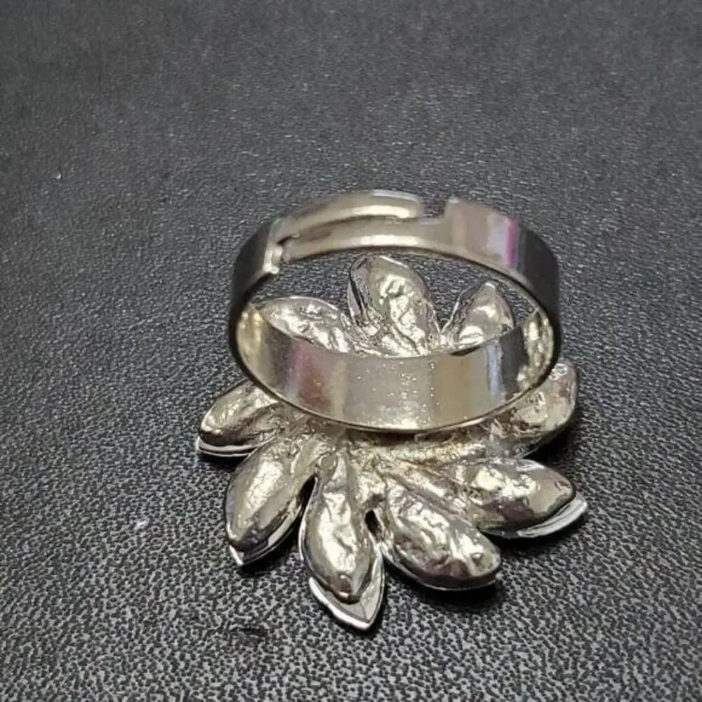 Silver tone clear rhinestone flower ring